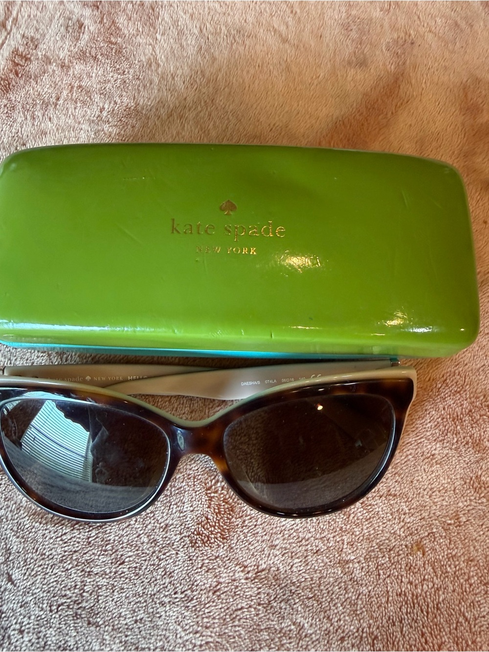 kate spade black tortoiseshell cat-eye sunglasses with green case